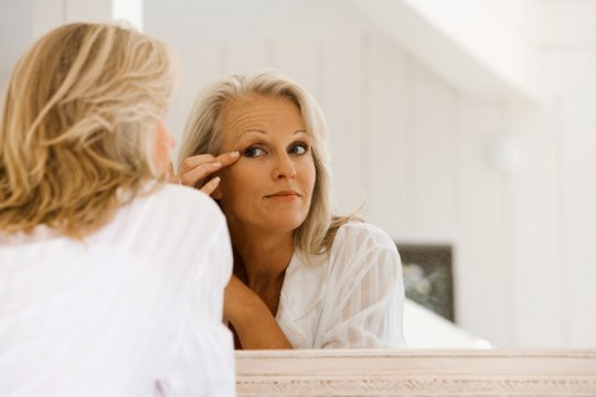 woman-in-mirror-sensitive-skin